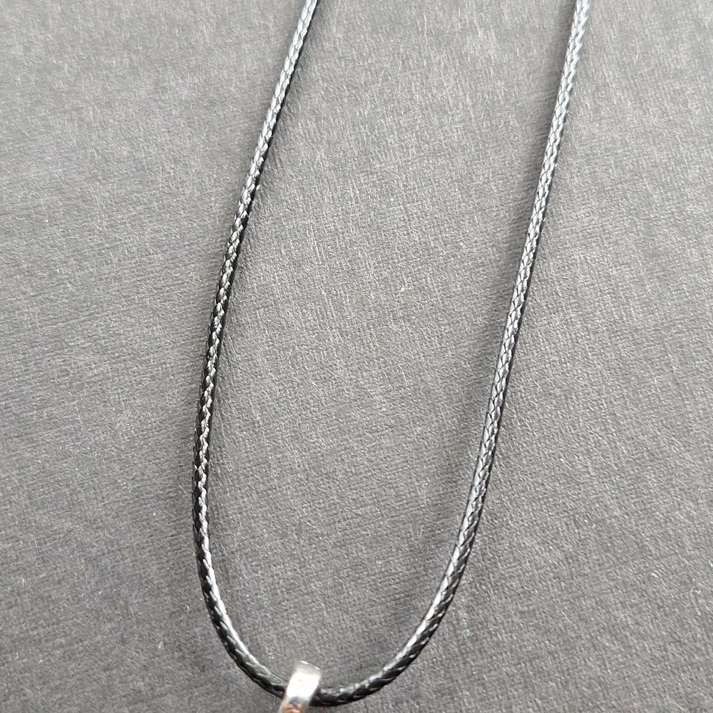 White crystal point pendant necklace on 16-inch faux leather chain